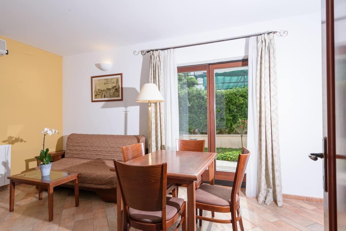 Apartment, 1 Bedroom, Terrace | Living area | Flat-screen TV