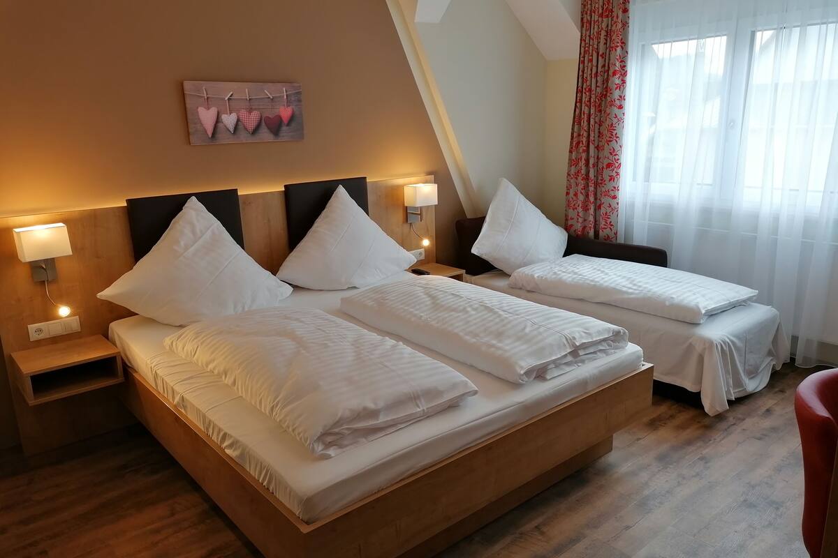 premium triple room | minibar, desk, soundproofing, free wifi