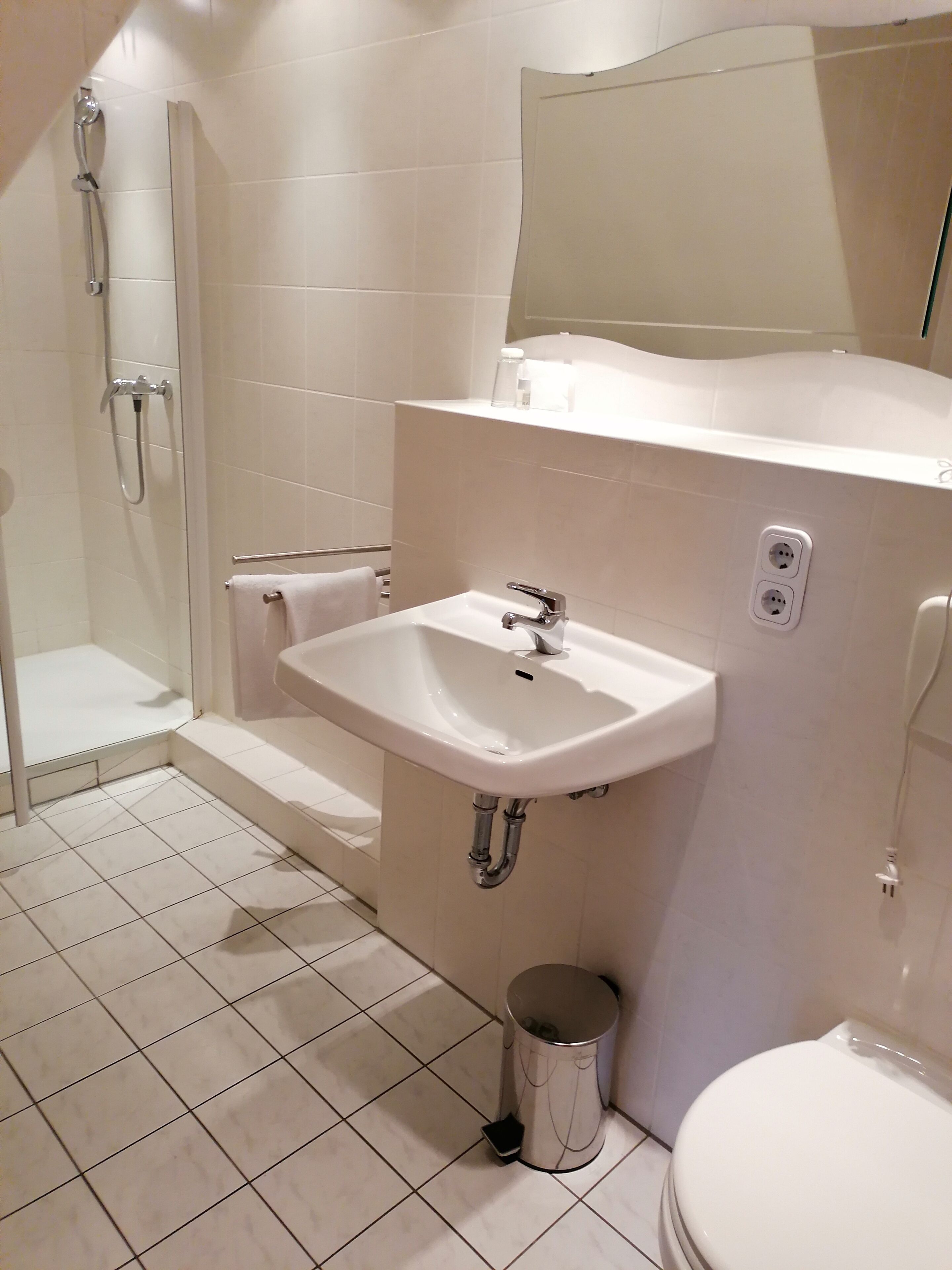 standard quadruple room | bathroom | shower, hair dryer, towels