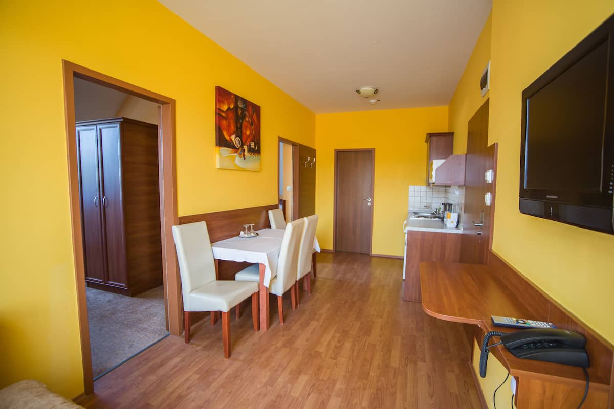 Deluxe Apartment, 2 Bedrooms | Living area | TV