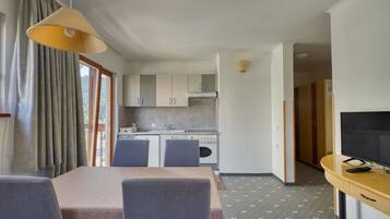 Family Apartment | In-room safe, blackout drapes, iron/ironing board, cribs/infant beds