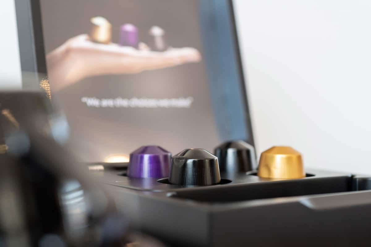 A close-up of a device with multiple colored knobs, likely a control panel or interface.