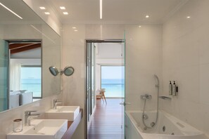 Pasiphae Beachfront Villa Front Sea View | Bathroom | Eco-friendly toiletries, hair dryer, slippers, bidet