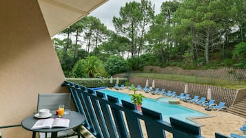 Habitación triple, balcón | Terraza o patio