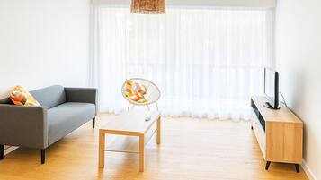 Family Suite | Living area | Flat-screen TV