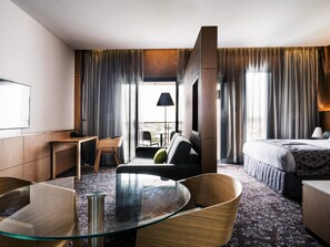 Suite ejecutiva, 1 cama King size y sofá cama | Sábanas de algodón egipcio y ropa de cama de alta calidad