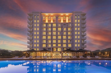 Indoor pool, seasonal outdoor pool, pool umbrellas, sun loungers