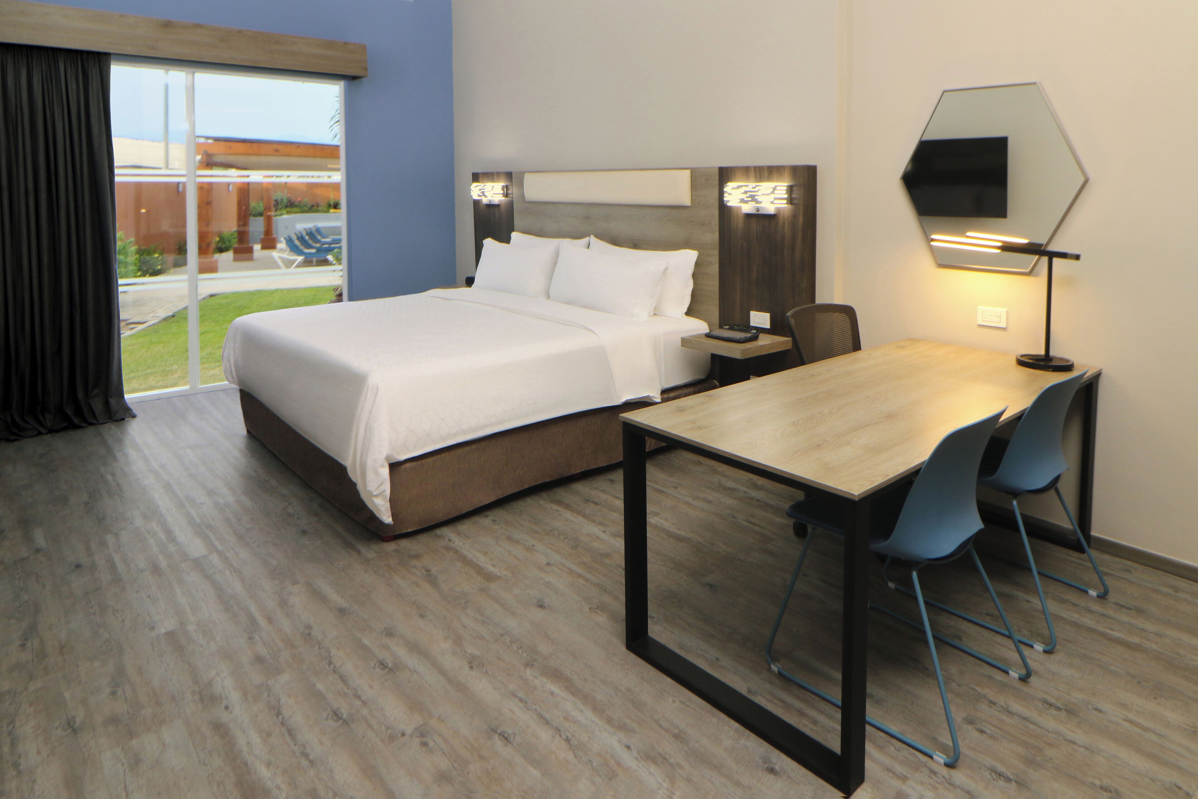 Down comforters, Select Comfort beds, in-room safe, desk