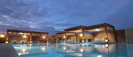 Outdoor pool, open 8:00 AM to 10:00 PM, pool umbrellas, sun loungers