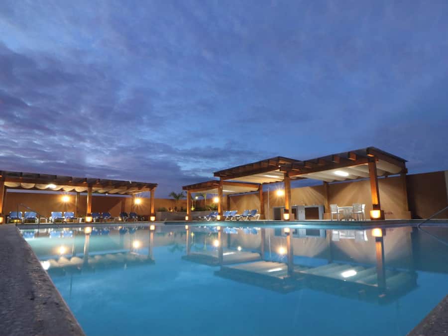 Outdoor pool, open 8:00 AM to 10:00 PM, pool umbrellas, pool loungers