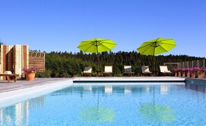 Outdoor pool, open 8 AM to 8 PM, pool loungers