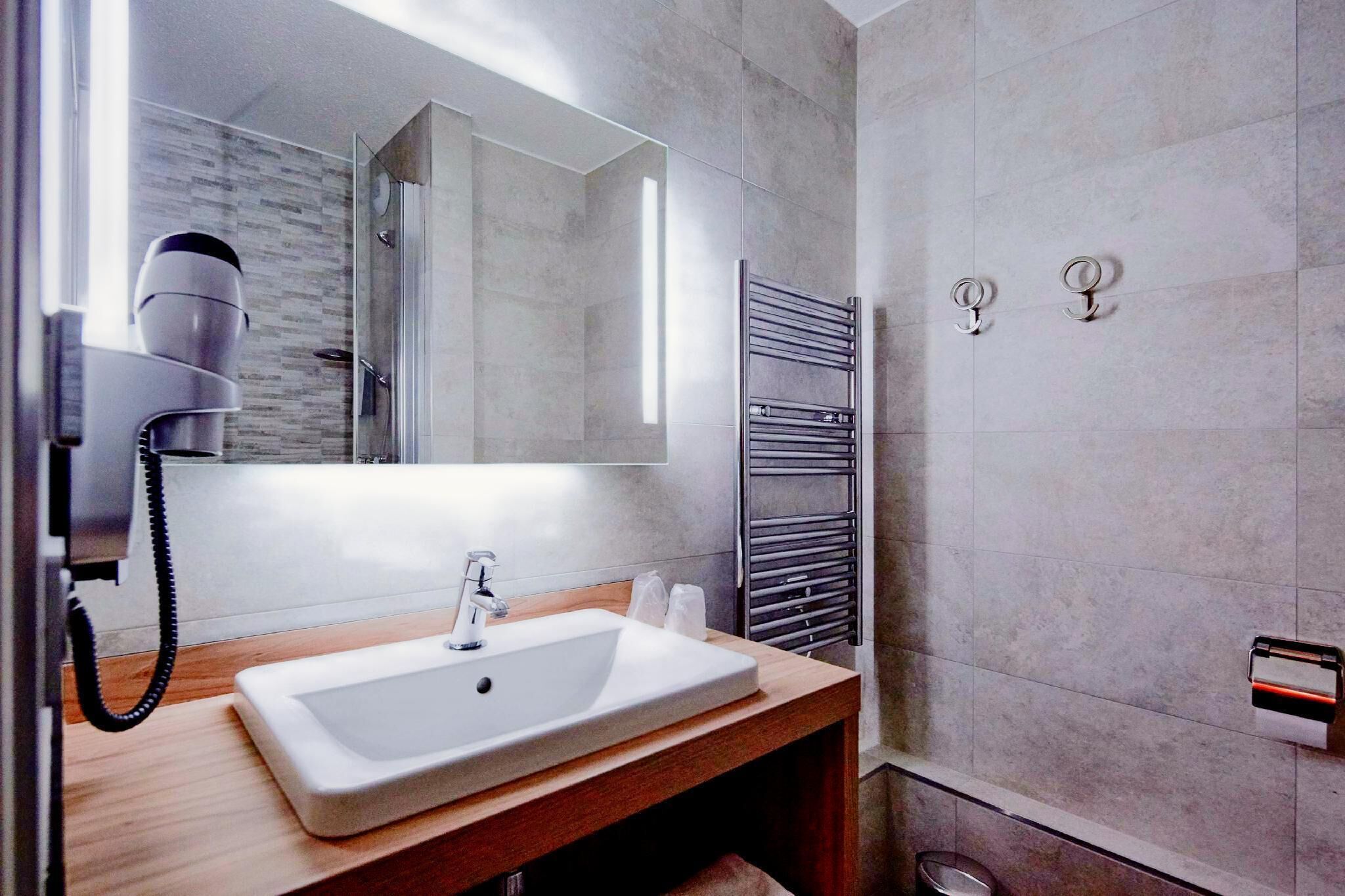 Bathroom | Eco-friendly toiletries, hair dryer, towels