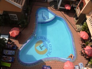 Outdoor pool, pool umbrellas, sun loungers