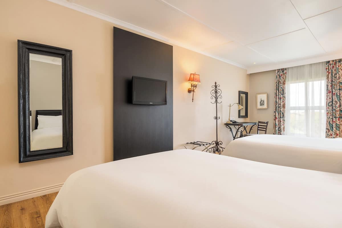 Premium bedding, down comforters, Select Comfort beds, in-room safe