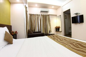 Desk, blackout curtains, cots/infant beds, free rollaway beds