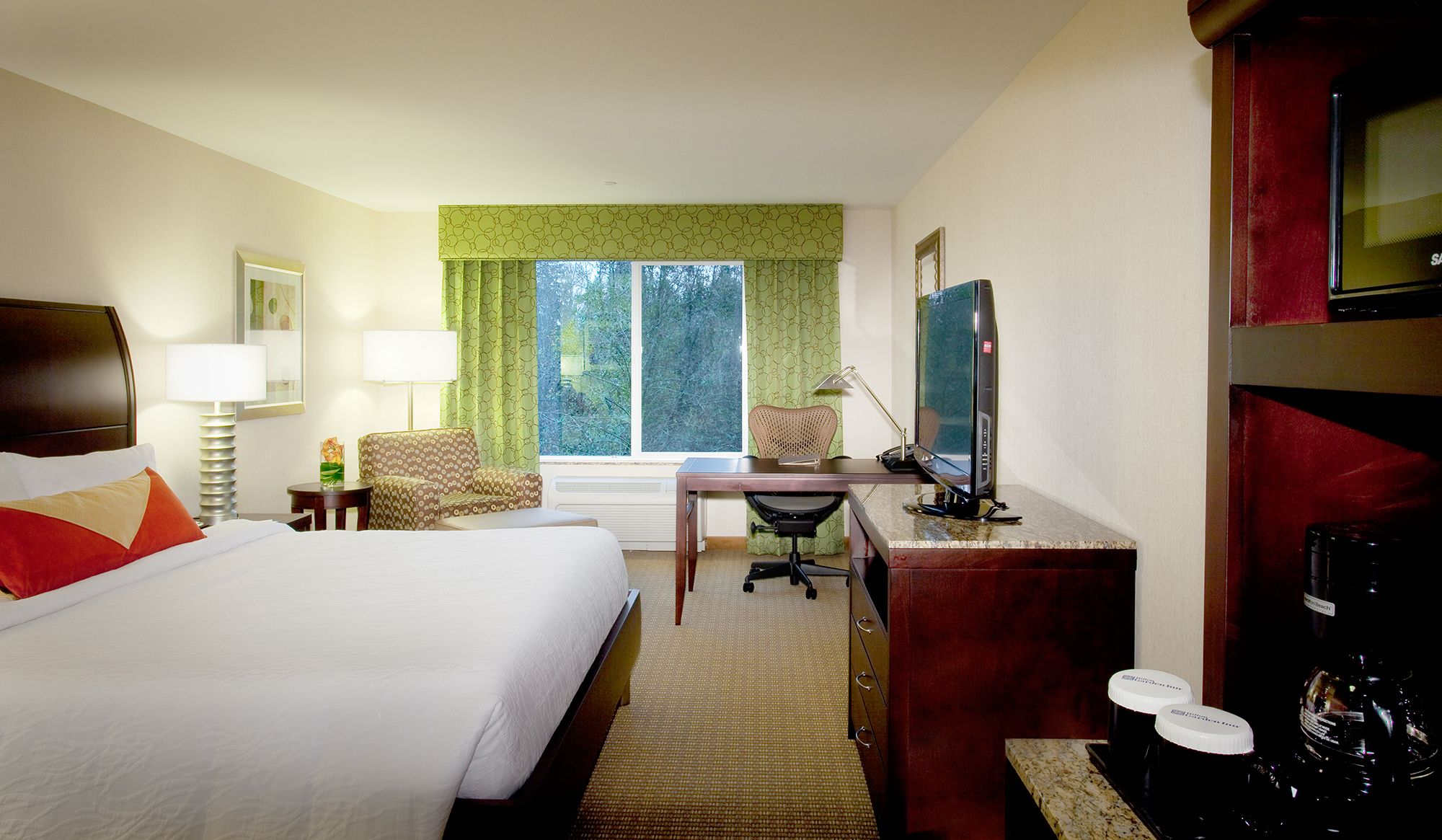 premium bedding, in-room safe, iron/ironing board, free cots/infant beds