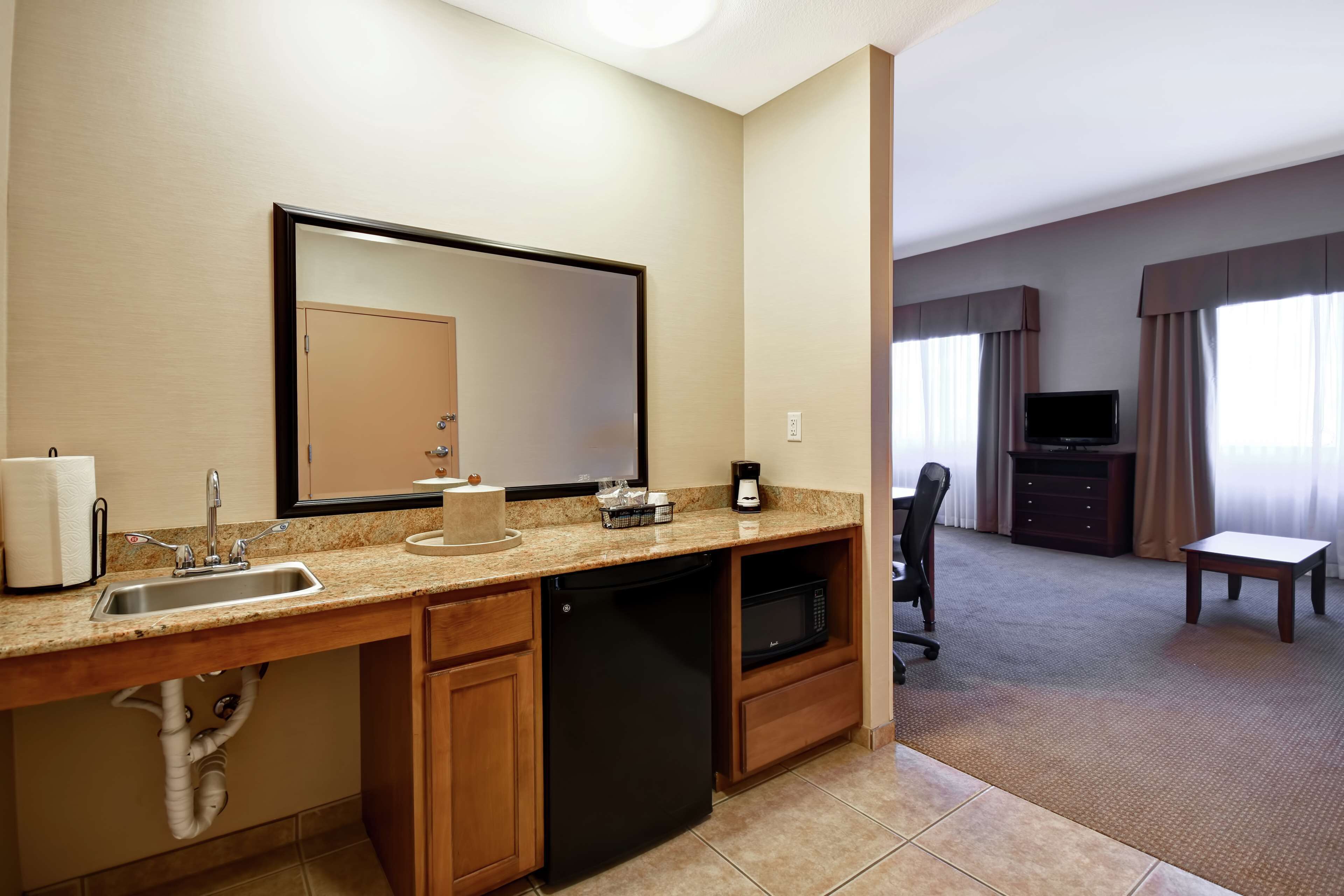 premium bedding, down duvets, pillow-top beds, in-room safe