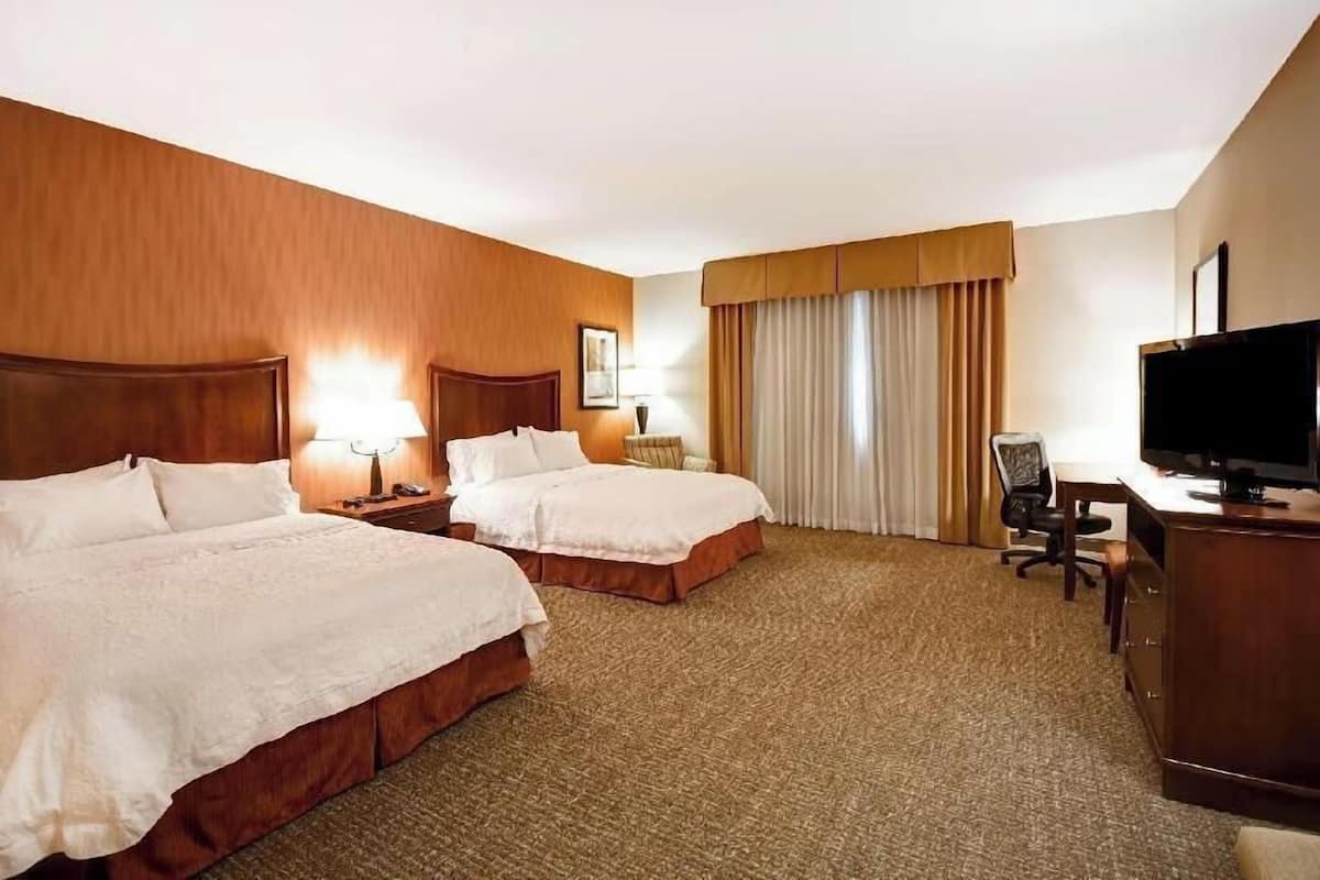 Premium bedding, down comforters, pillowtop beds, in-room safe