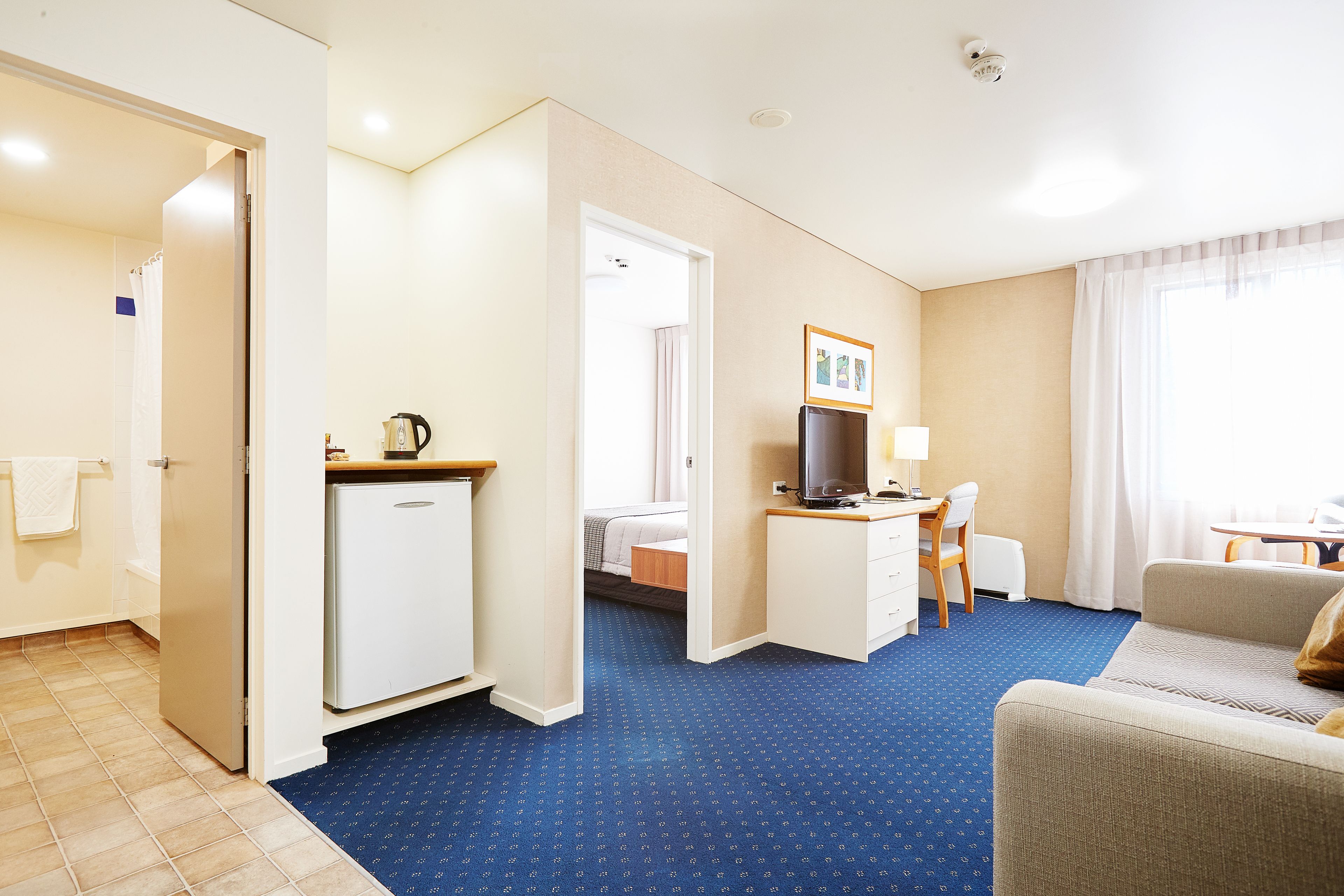 standard suite | living area | 43-inch lcd tv with digital channels, tv, netflix