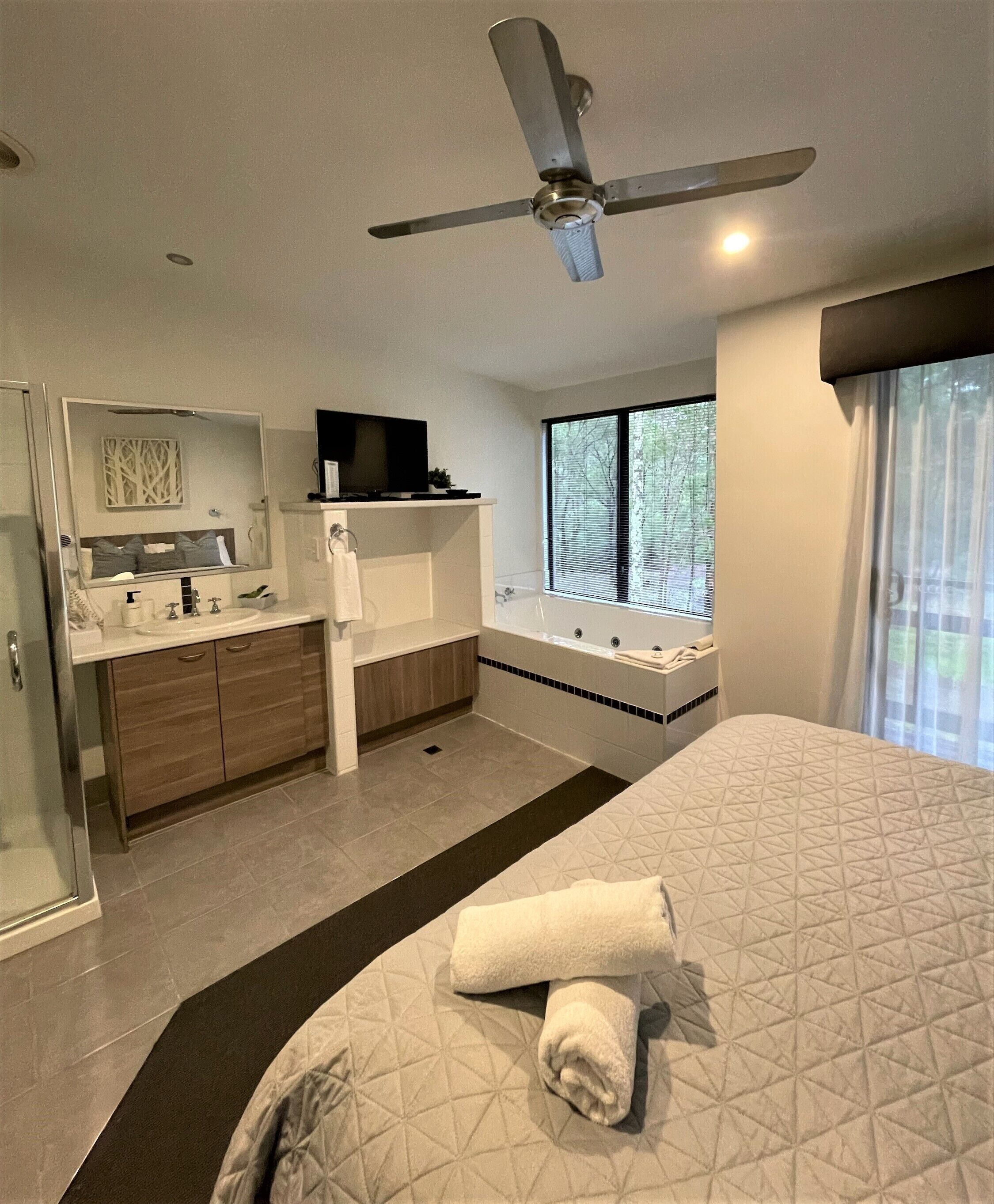 Two Bedroom Two Spa Apartment | Bathroom | Hair dryer, towels, soap, shampoo