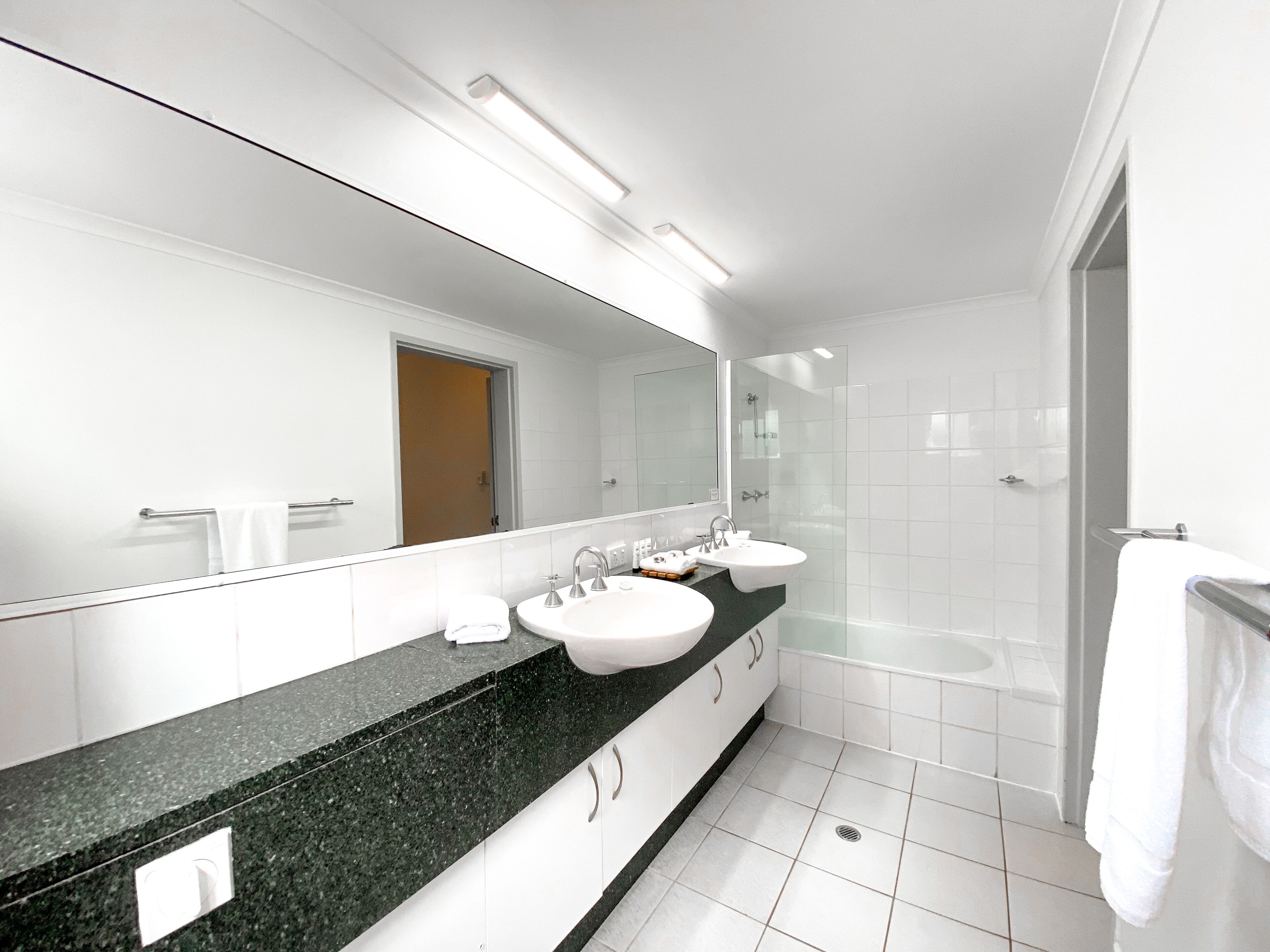 2 bed/2 bath balcony | bathroom | designer toiletries, hair dryer, towels, soap