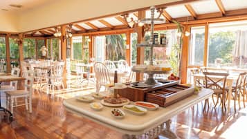 Breakfast, lunch served; local and international cuisine, garden views