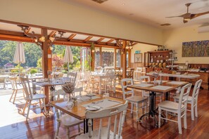 Breakfast, lunch served; local and international cuisine, garden views 