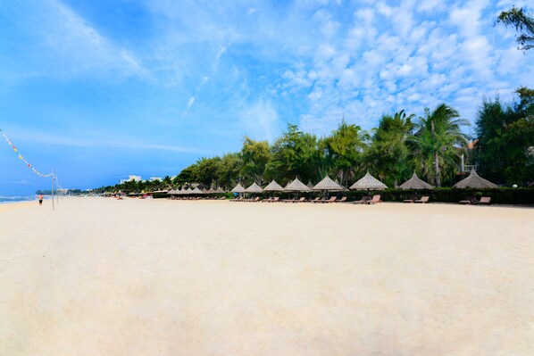 Private beach, white sand, sun loungers, beach umbrellas