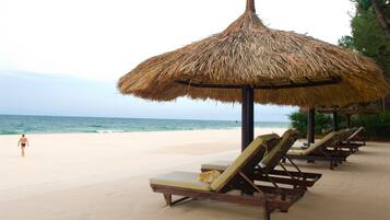 Private beach, white sand, sun-loungers, beach umbrellas