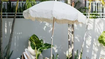 Outdoor pool, pool umbrellas, pool loungers