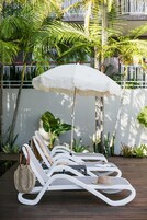 Outdoor pool, pool umbrellas, pool loungers