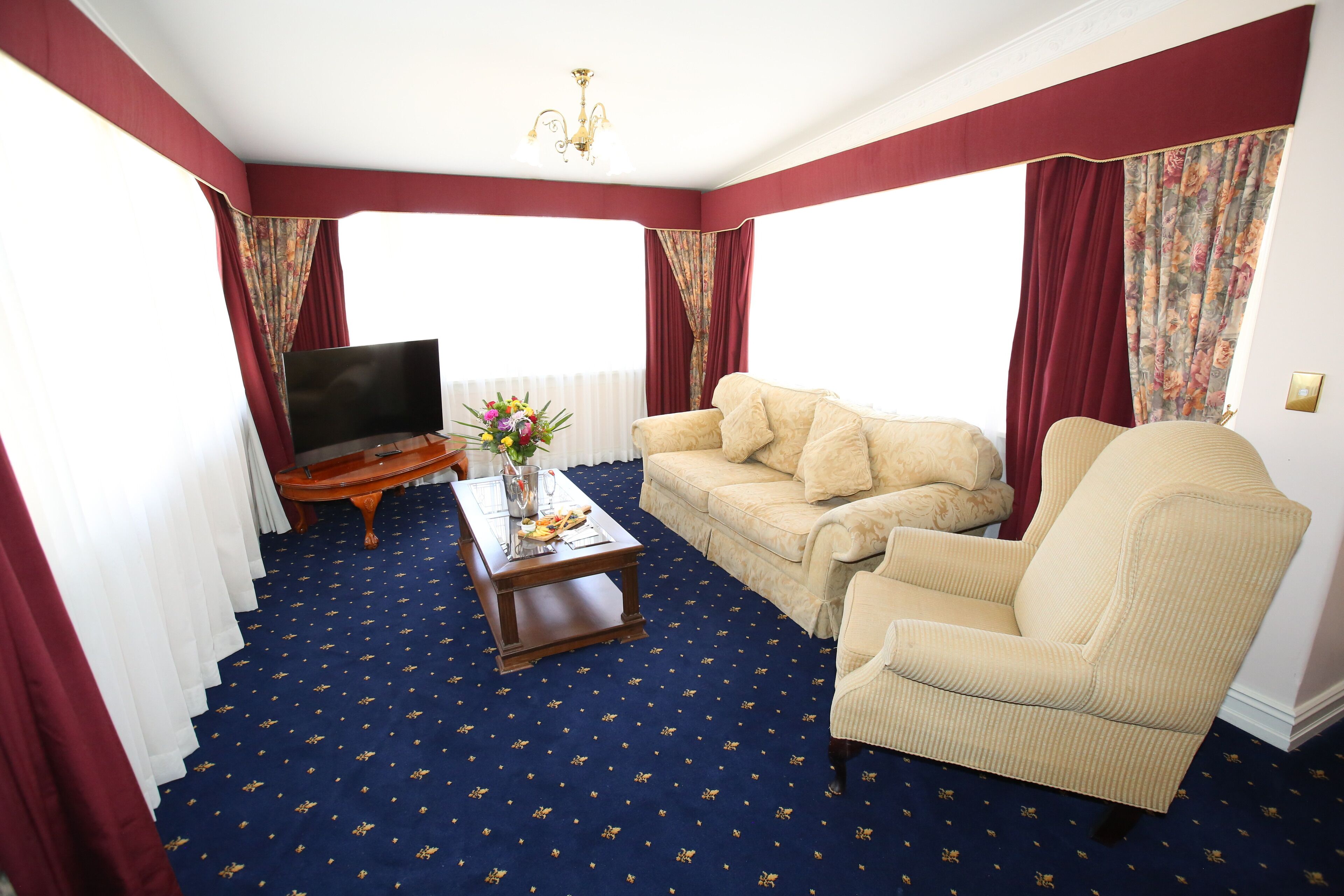 premium double room | living area | lcd tv, netflix, streaming services