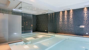 Indoor pool, open 2:00 PM to 8:30 PM, pool loungers