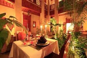 Breakfast, lunch, dinner served; Moroccan cuisine, pool views 