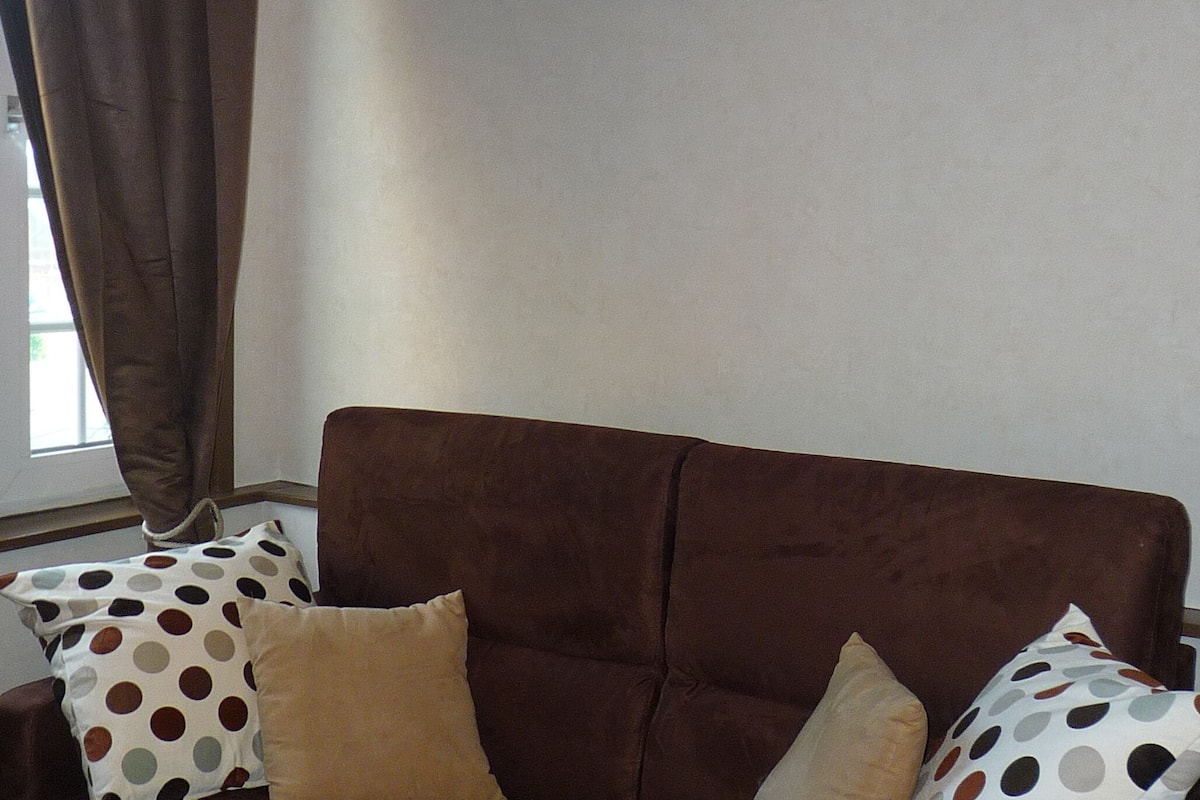 triple room | living area | tv