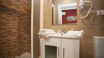 Standard Single Room, 1 Bedroom, City View | Bathroom | Shower, rainfall showerhead, free toiletries, hair dryer