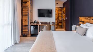 Ropa de cama de alta calidad y minibar