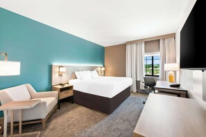 Desk, laptop workspace, iron/ironing board, free cribs/infant beds