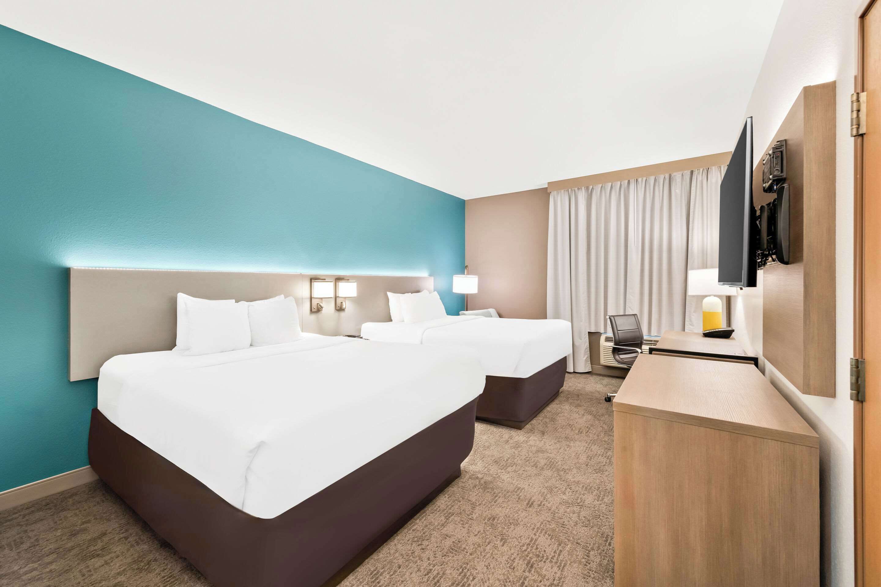 standard room, 2 queen beds, non smoking | desk, laptop workspace, iron/ironing board, free cots/infant beds