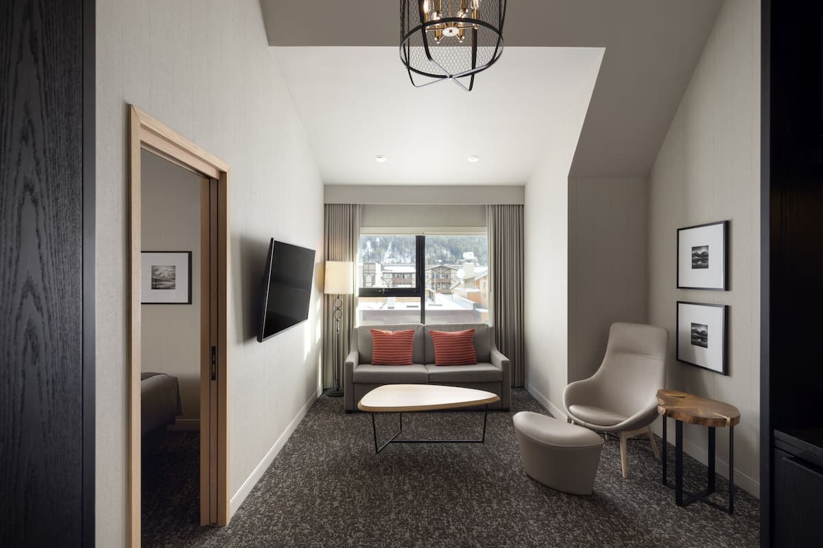 Summit One Bedroom Suite, 1 King bed | Living area | 40-inch flat-screen TV with cable channels, TV