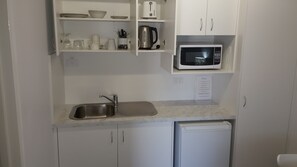 Chambre Signature Double ou avec lits jumeaux, plusieurs lits | Cuisine privée