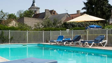 Seasonal outdoor pool, open 9 AM to 9 PM, pool umbrellas, sun loungers