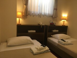 Twin Room, 2 Twin Beds | In-room safe, desk, blackout drapes, soundproofing