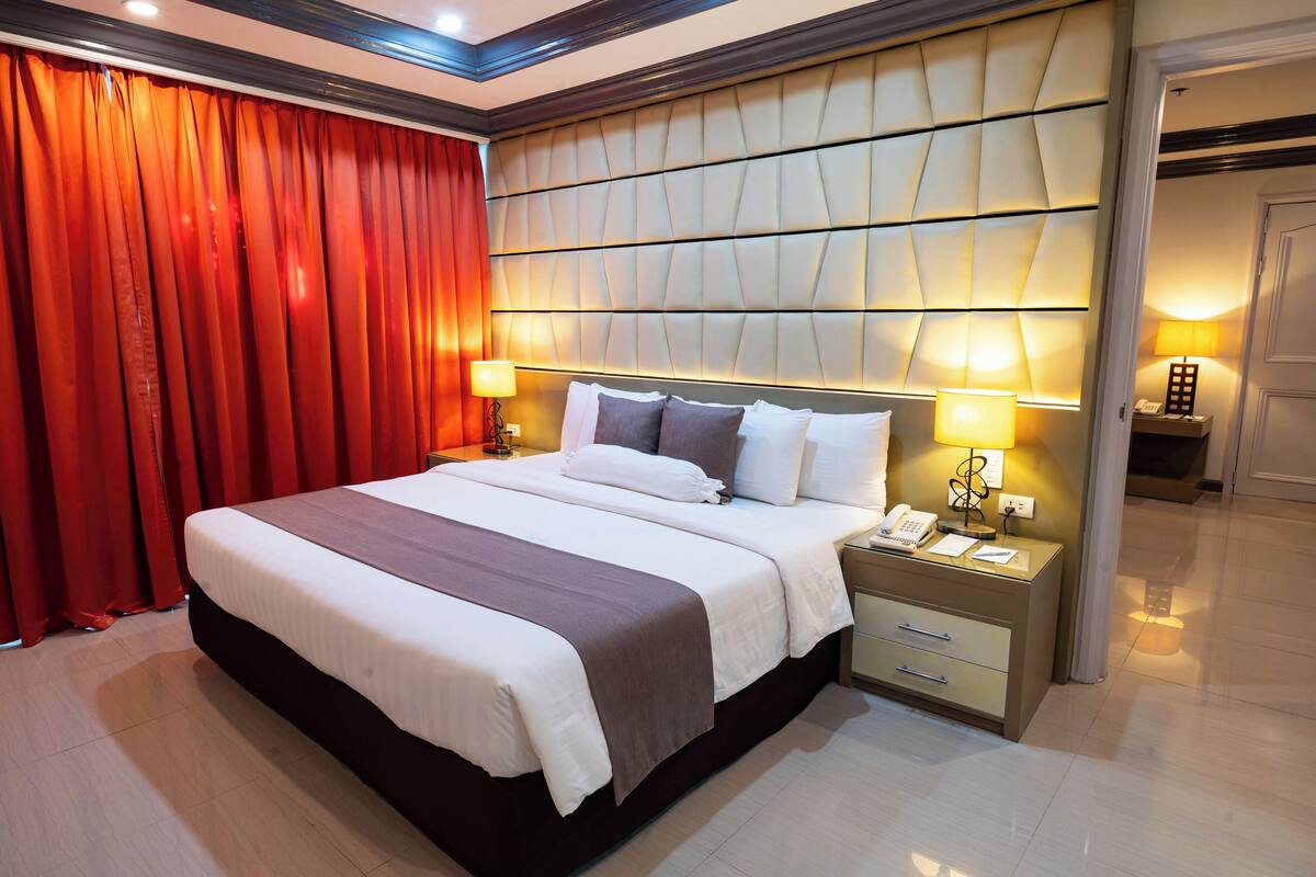 Habitación ejecutiva | Minibar, escritorio, wifi gratis y ropa de cama 
