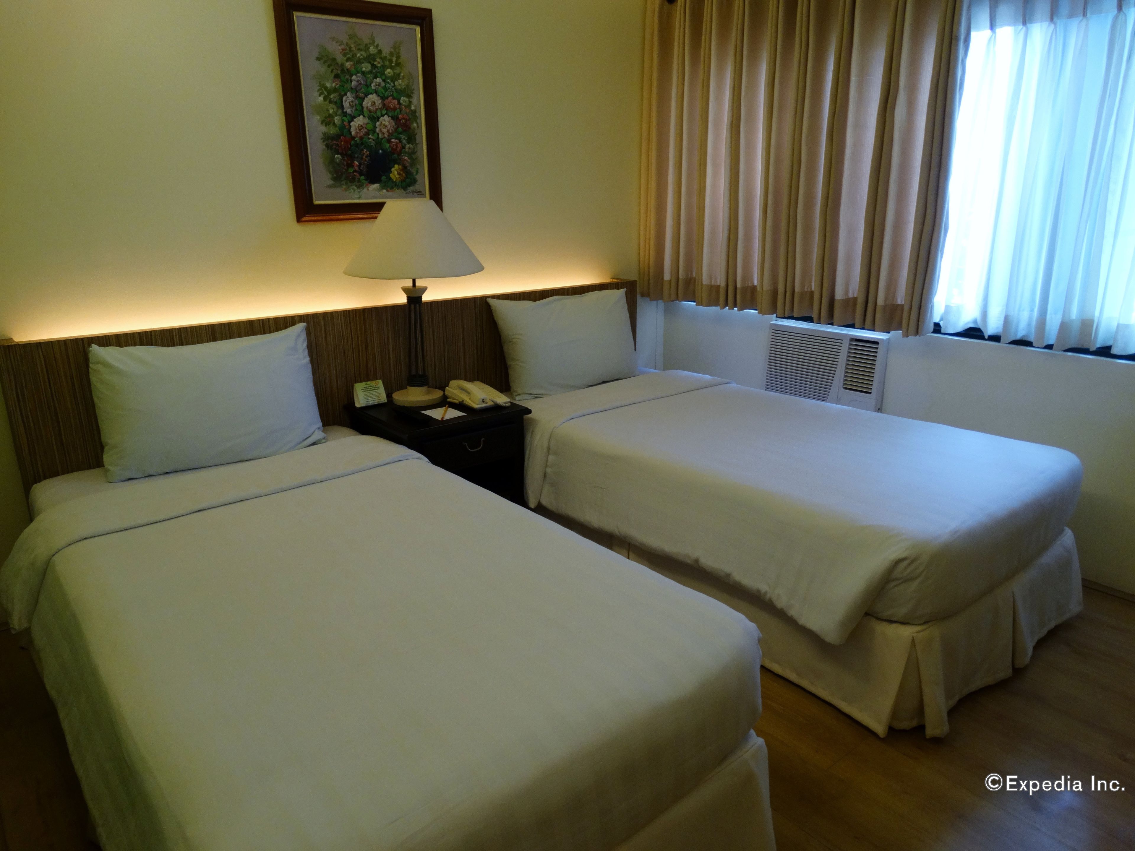 deluxe room | minibar, desk, laptop workspace, blackout curtains