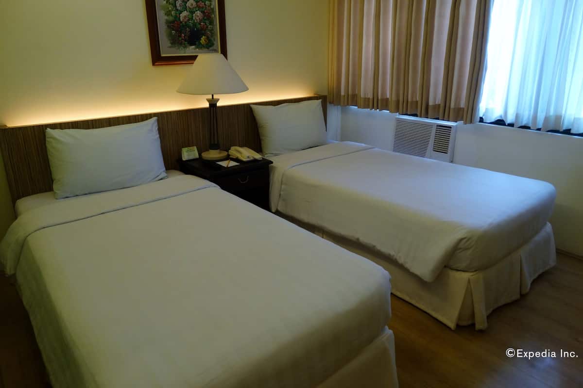 deluxe room | minibar, desk, laptop workspace, blackout curtains