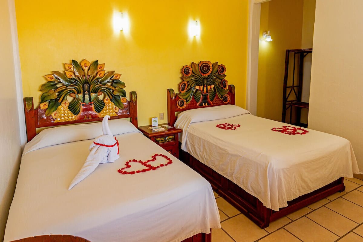 Premium bedding, in-room safe, iron/ironing board (on request)