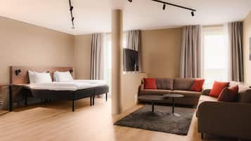 Down duvets, pillow-top beds, in-room safe, desk