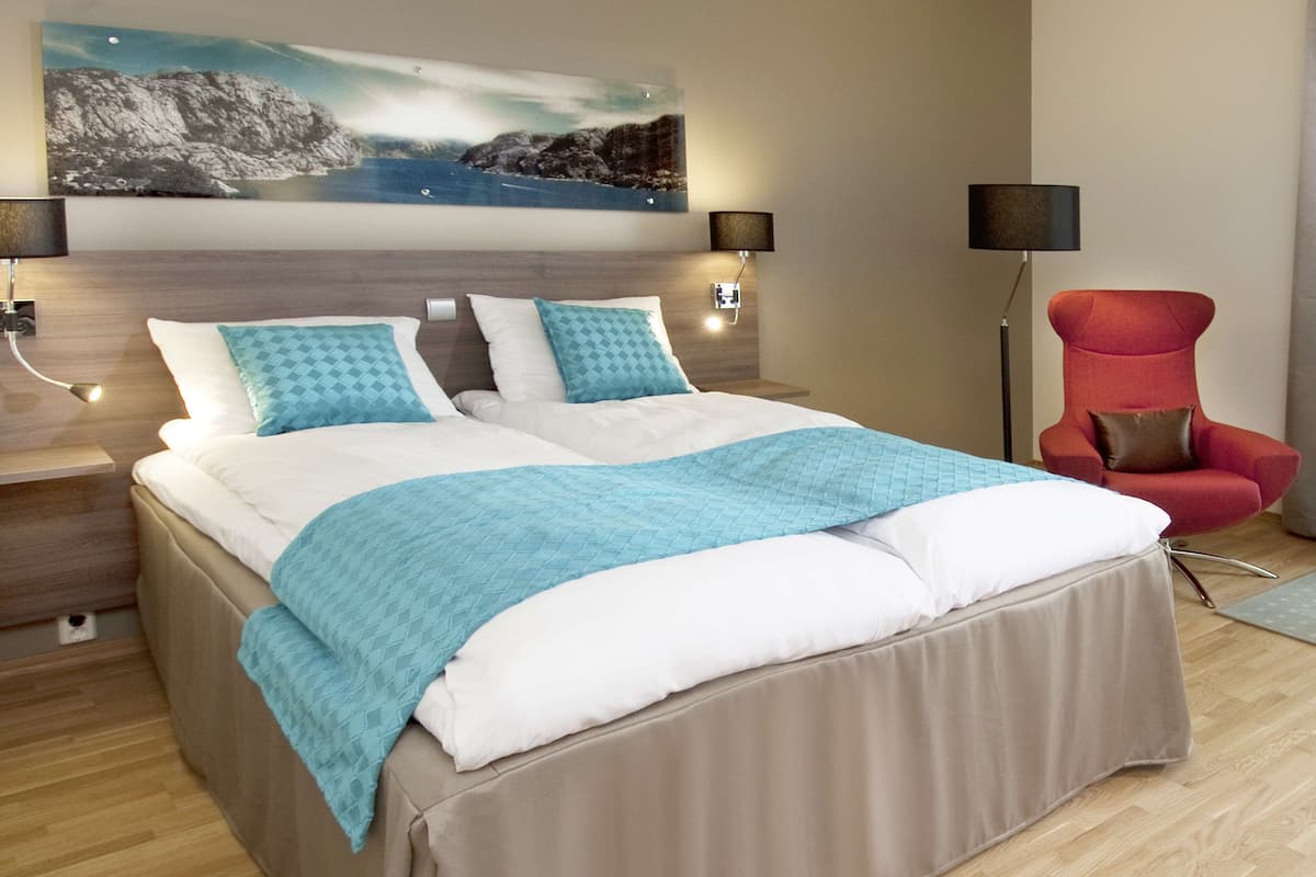 Down comforters, pillowtop beds, in-room safe, desk