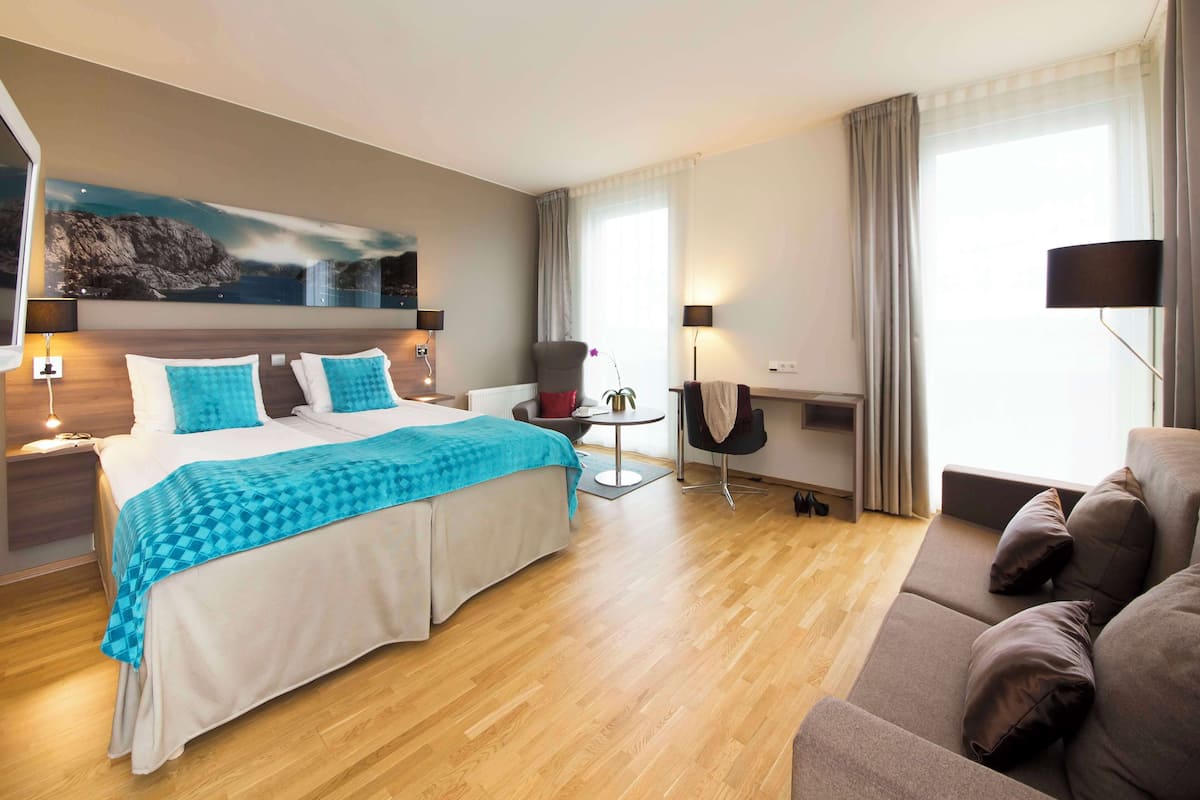 down duvets, pillow-top beds, in-room safe, desk